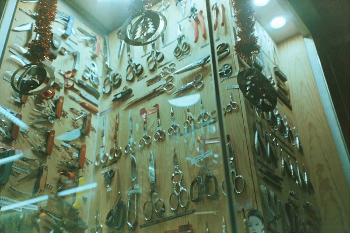 Comparison of home depot saw blades on a workbench with measuring tape and wood samples
